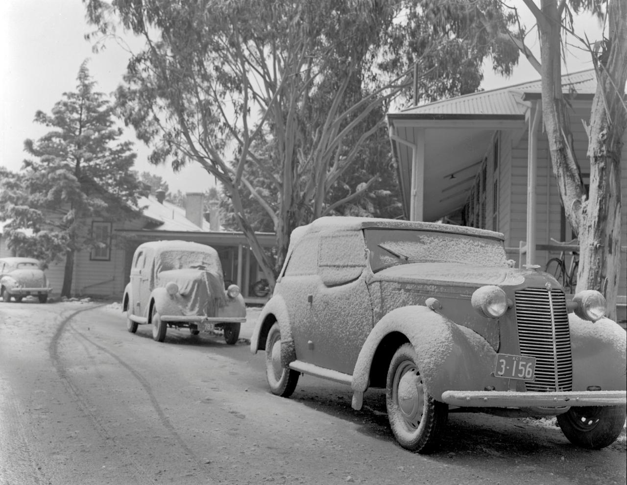 Snow on cars at Acton Guest House