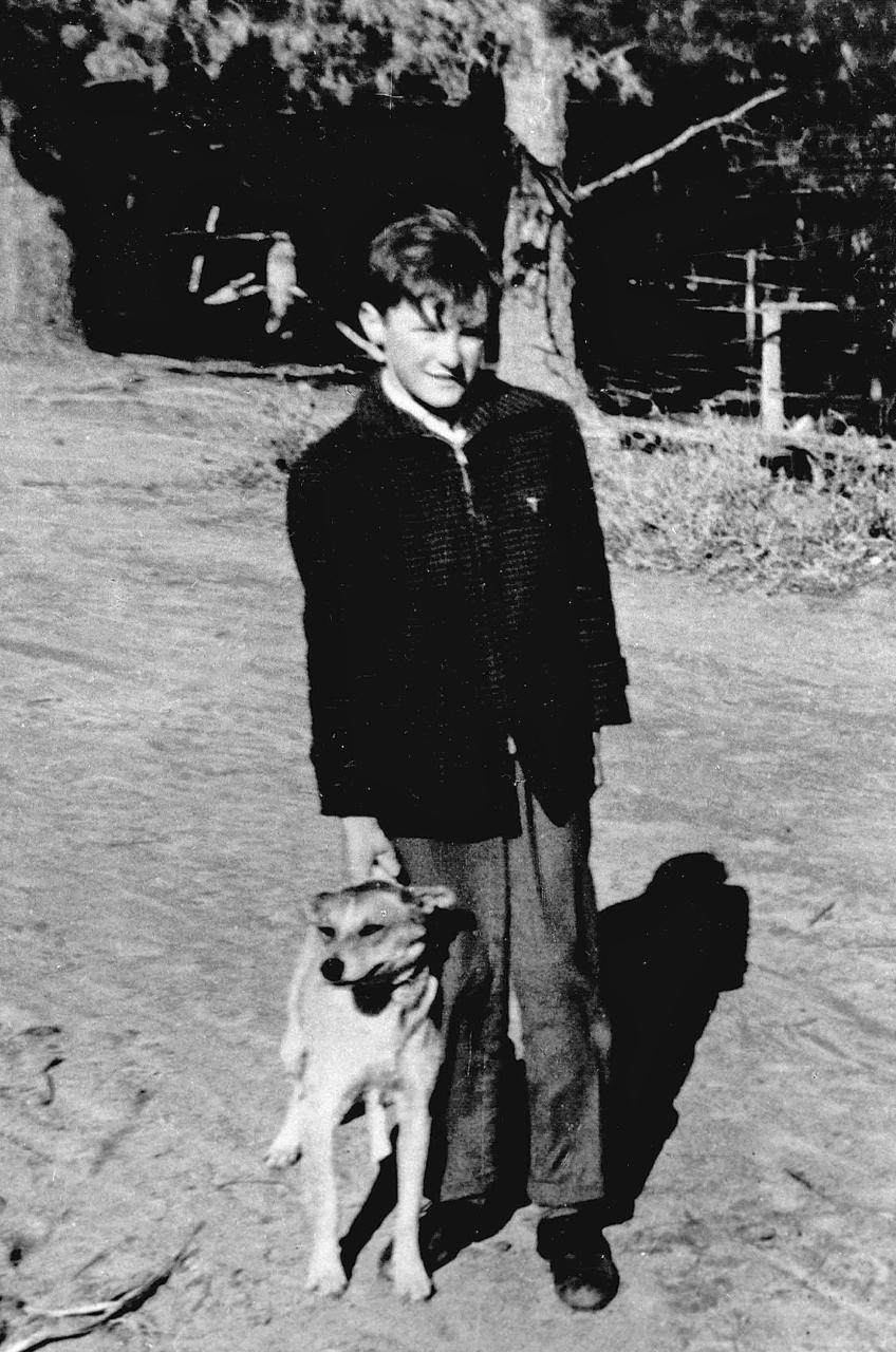 Billy Johnston outside riding school stables