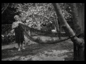 Christina Dunshea with camouflage net at Acton cottage no. 4