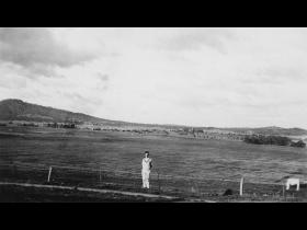 Frank Waight in front of Acton flats